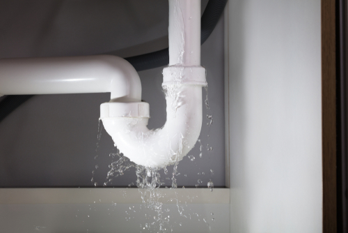 burst pipe under sink, water damage restoration services Green Clean MN